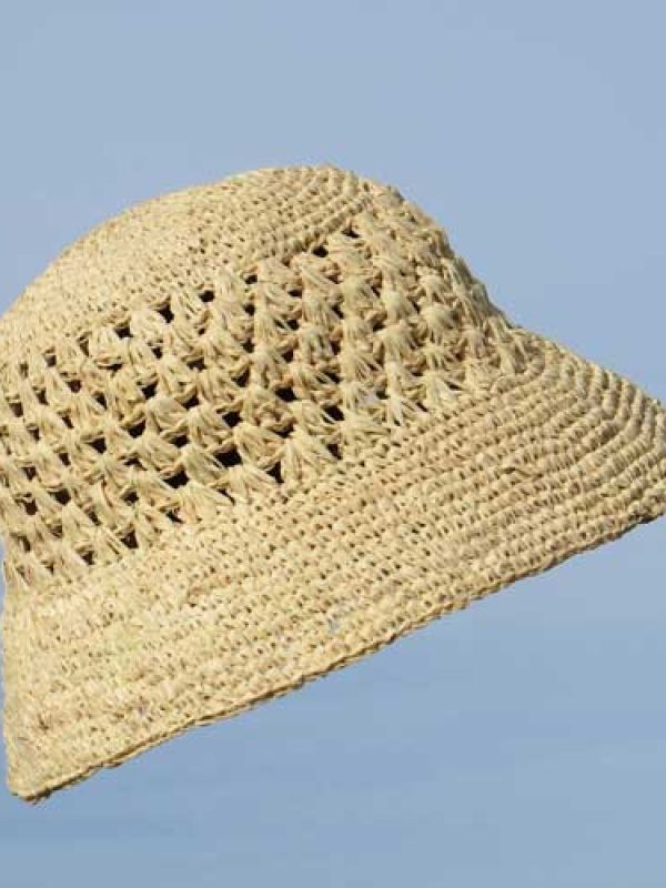 5. Hat from Denise's home village crocheted from raffia palm leaves. Find the hat in La Maison Afrique FAIR TRADE range by clicking below.